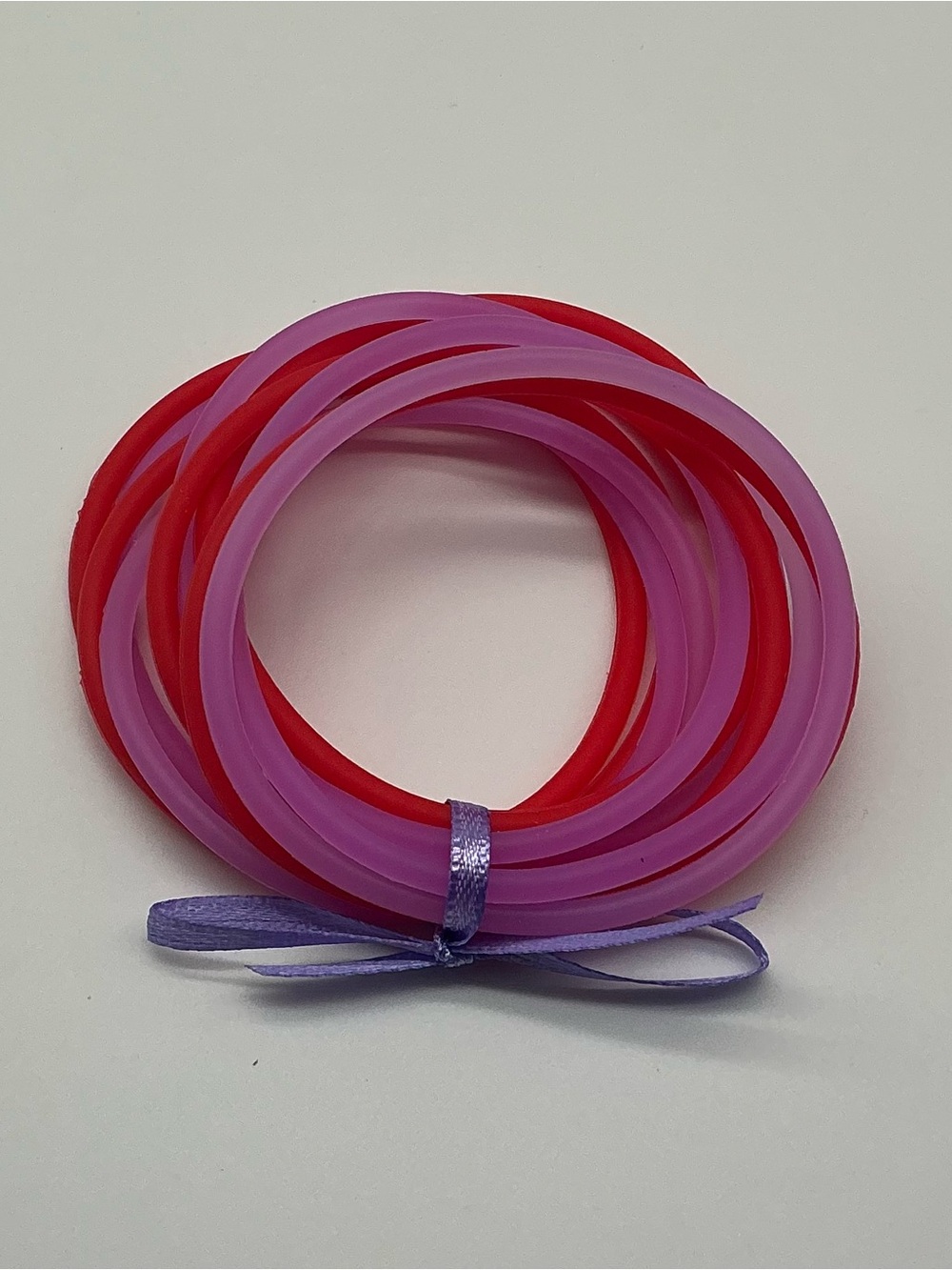 Set of 12 Red and Pastel Purple Jelly Bracelets